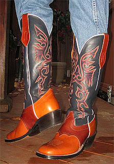 cowboy boots with jeans tucked in