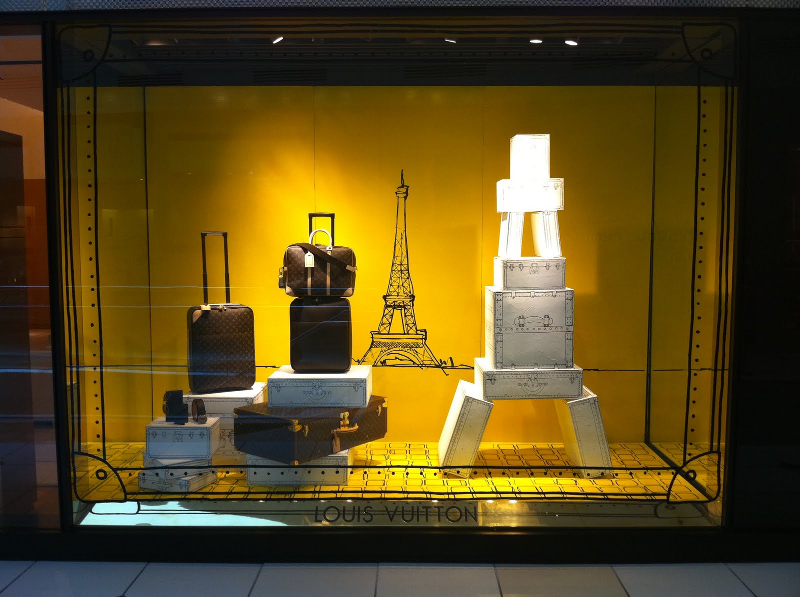 I Spywith a visual merchandising eye!: Louis Vuitton keeps an eye on the  Eiffel Tower