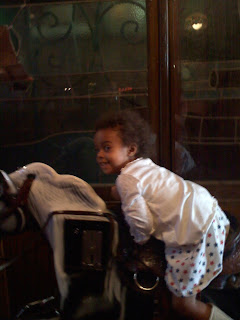 Annika, riding a horse.