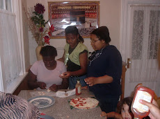 Making pizza at a Sisters Program sleepover.