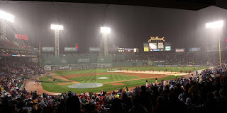 photograph of red sox fenway park in boston massachusetts during a rain delay baseball sports