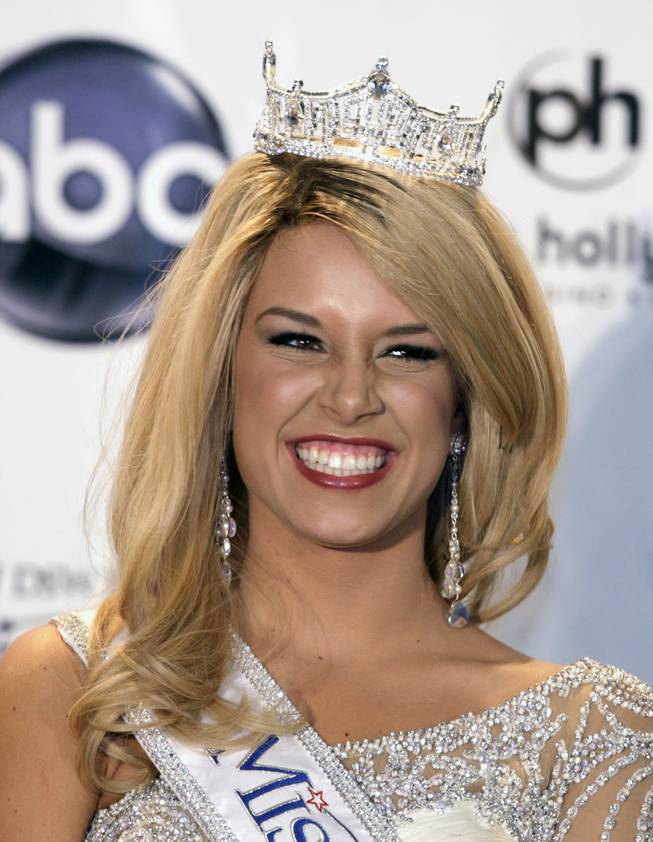 Teresa Scanlan smiles during a news conference after winning the 2011 Miss 
