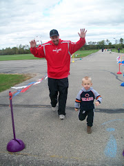 Daddy and Sy finishing the race!