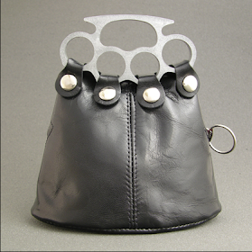 purse with brass knuckle handle