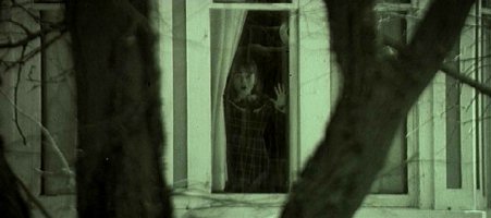 [house-by-the-cemetery-window-girl.jpg]