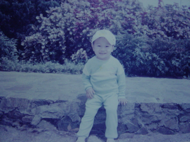 Lucky Little Boy in Garden