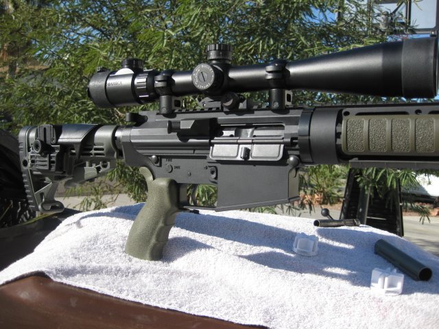 Heavily used ar-10 Recoated to factory color and stipple to match scope exactly!