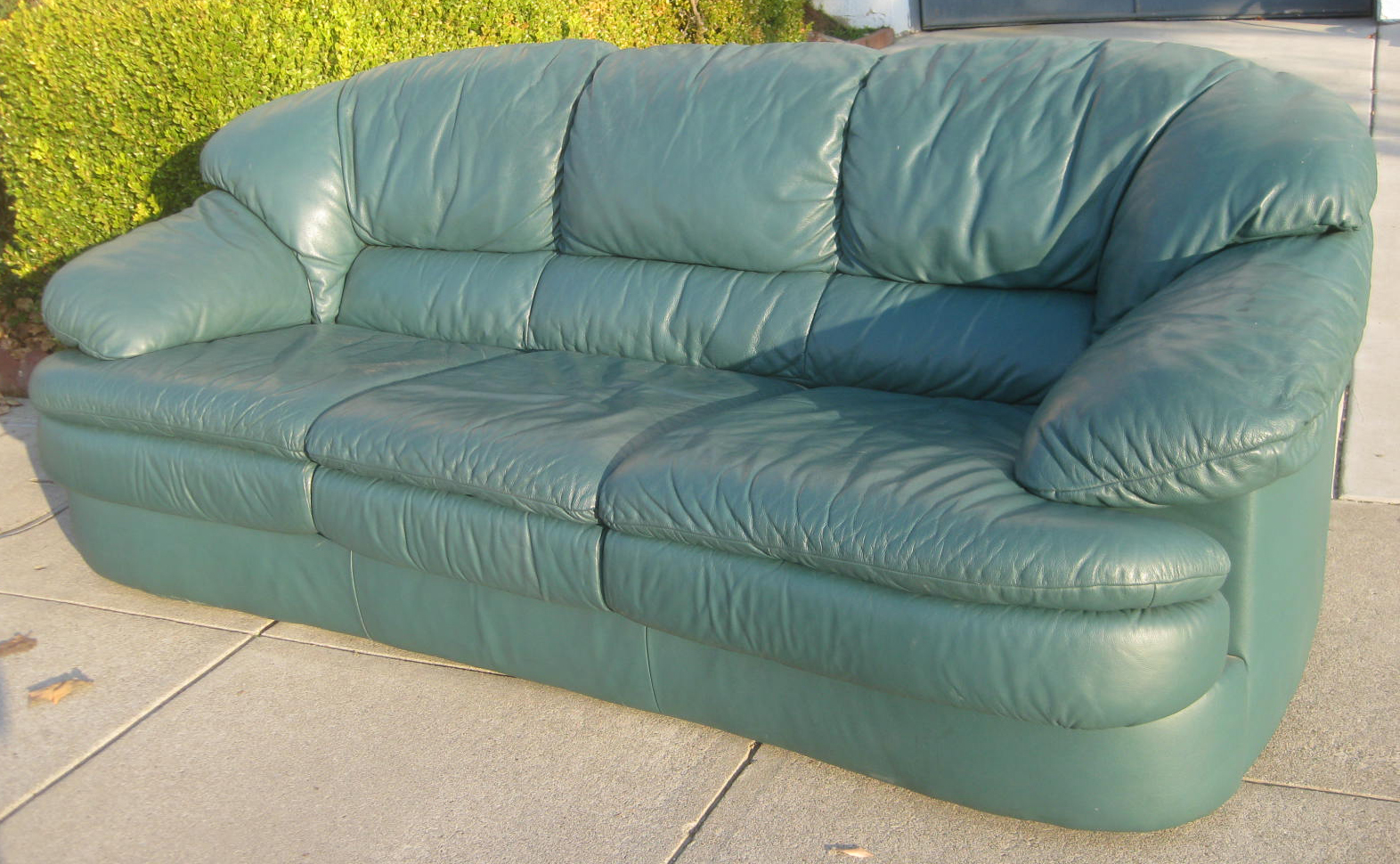 green traditional leather sofa