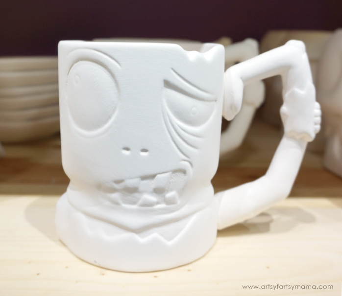 Easy Zombie Punch recipe for Halloween served in a custom-painted Zombie Mug from As You Wish Pottery!