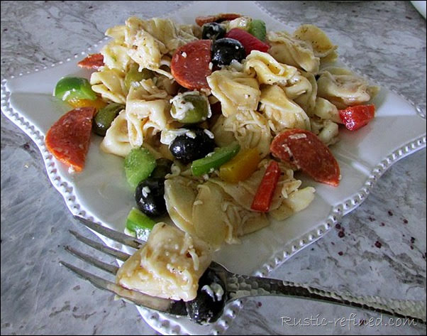 Amazing and versatile cheese tortellini pasta salad. Can be served hot or cold and stores for days!