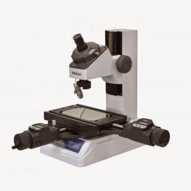 Toolmaker's microscope with digimatic micrometer heads.