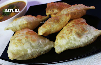 batoora with chickpea curry chole batura indian breakfast recipe