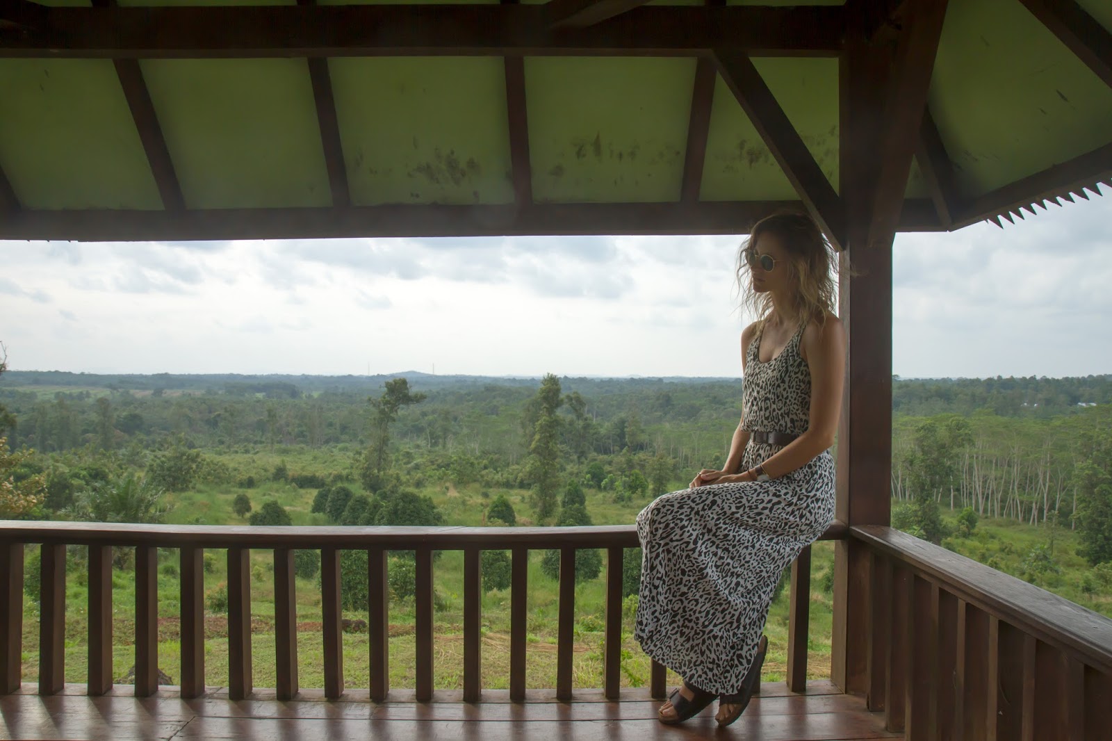 travel blogger, Alison Hutchinson, admiring the beautiful landscape of Belitung