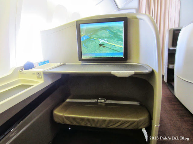 JAL Suite’s comes with an ottoman and an adjustable table