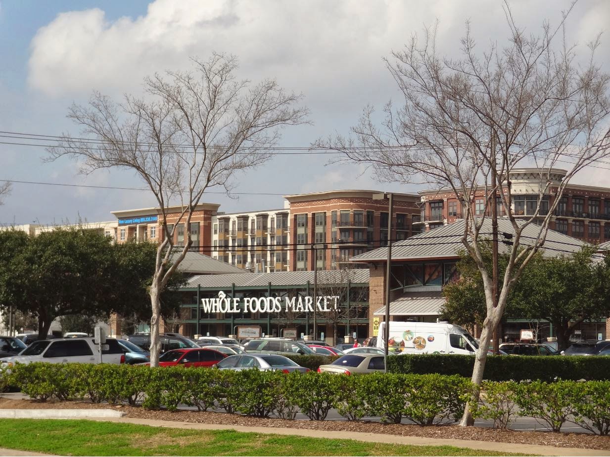 Whole Foods Market grocery store on W Alabama at Kirby Drive Photo of Whole Foods Market on W Alabama at Kirby Drive across parking lot
