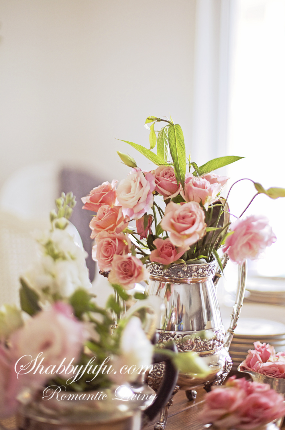 How To Decorate For Fall With Mixed Metals pink roses in a silver pot
