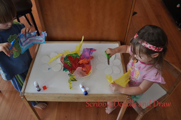 flower craft for kids made by cutting and gluing painted tissue paper