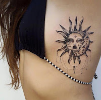 Tatuajes femeninos en las costillas sol y luna