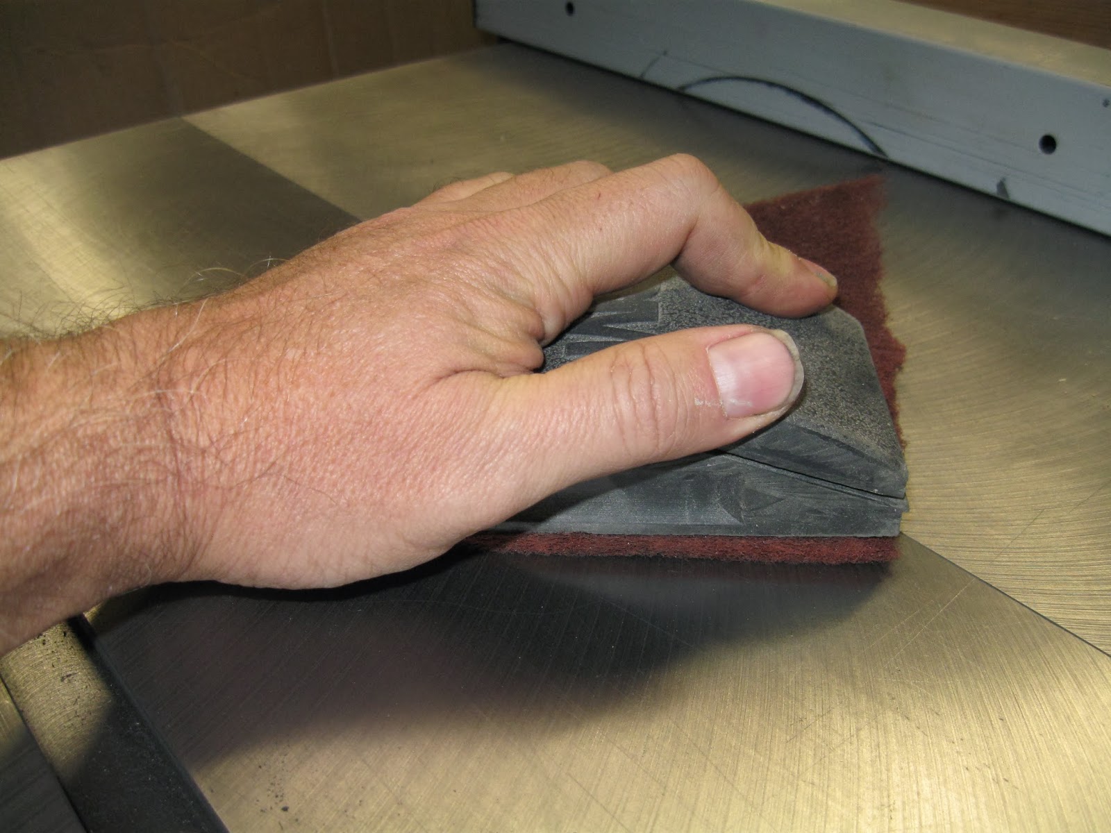Easy Cheesy Garge A Rubber Sanding Block and Scotchbrite To Cleanup