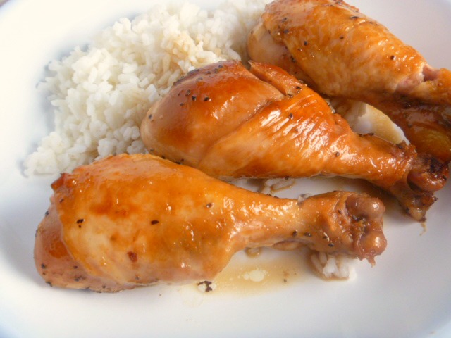 Baked Honey Soy Chicken Legs:  Tender, juicy chicken legs doused with a wonderful honey soy sauce served over a bed of fluffy rice.  What could be more comforting than that? Slice of Southern