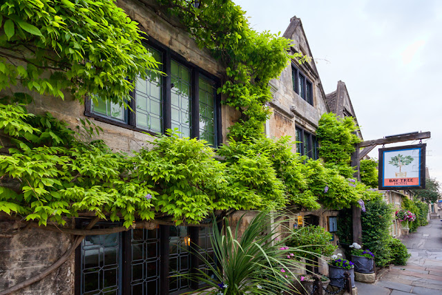 This beautiful Cotswold building houses The Bay Tree Hotel by Martyn Ferry Photography