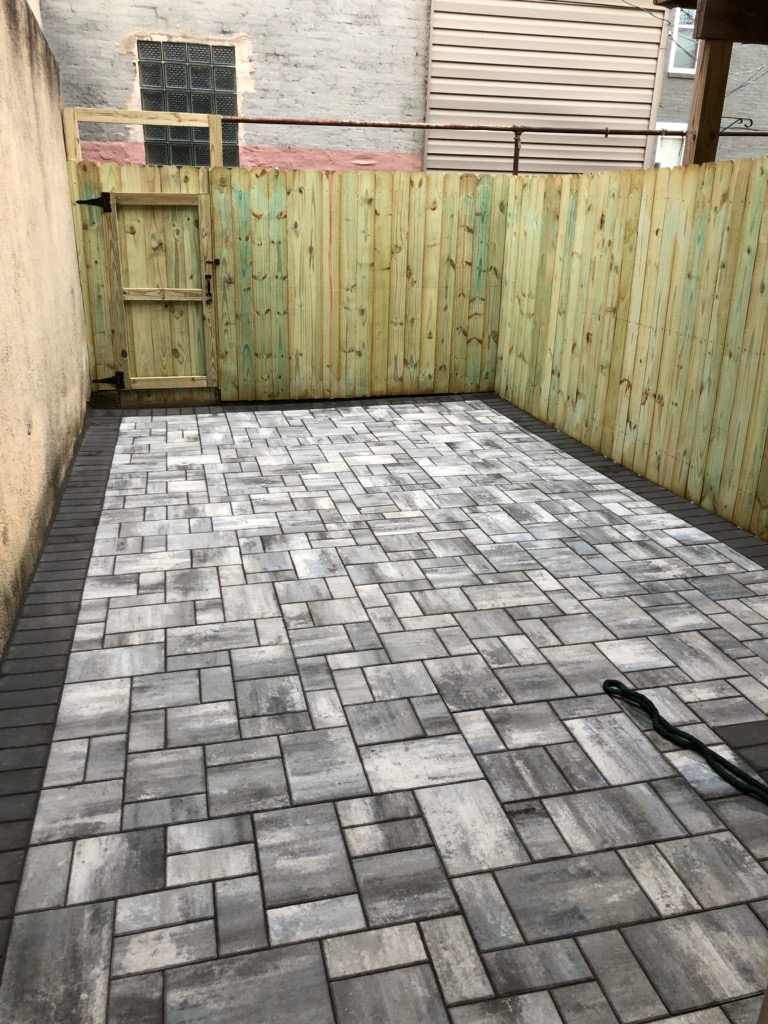 Custom Stoneworks & Design Inc. Paver Patio with slab style pavers new