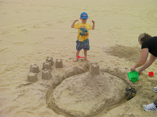 sandcastle with moat, motte and bailey