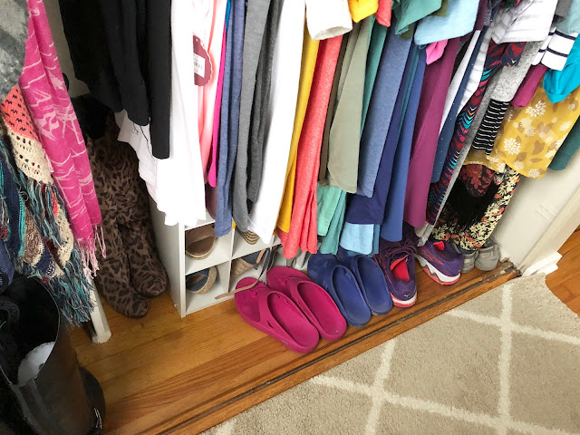 Organized closet using Container Store shoe bins and shelf dividers