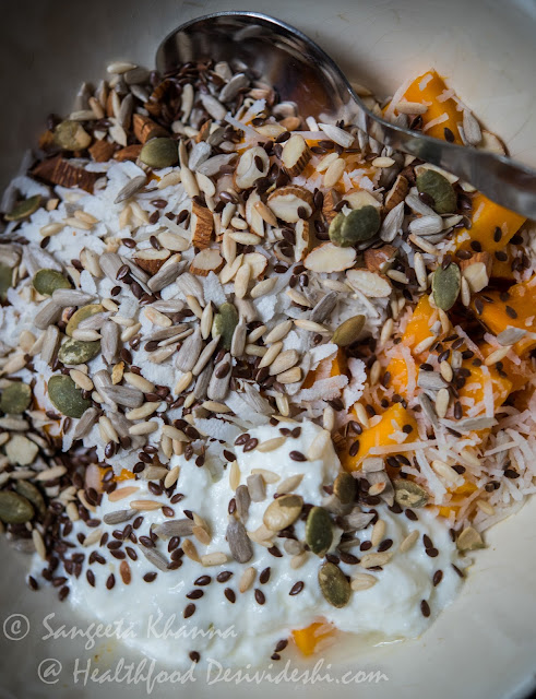 chiwda dahi (beaten rice with yogurt, fruit and nuts)