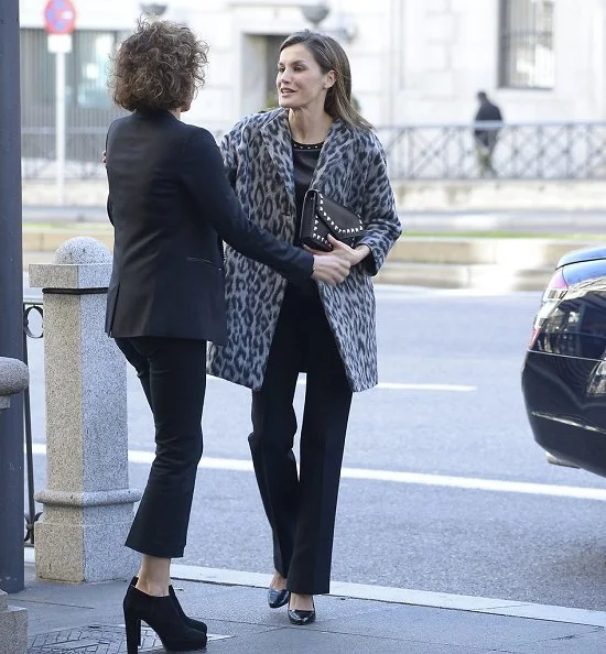 Queen Letizia wore Hugo Boss Printed Coat with Wool, Uterque Peplum Nappa Top and Magrit pumps, carried Uterque Studded messenger bag