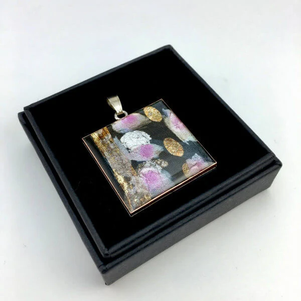 square modern painted pendant with resin coating in square black box