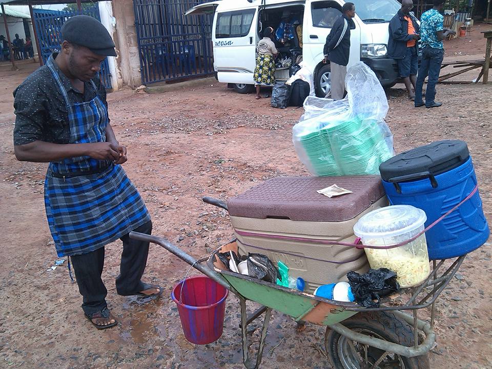 Photos Unemployed Igbo Graduate Caught Selling Food On Ekpoma Streets