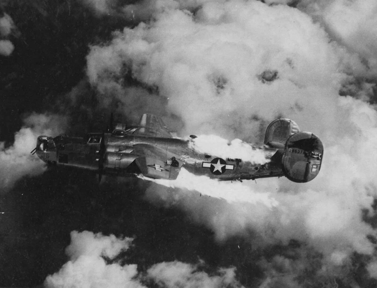 This aircraft is pictured just moments before it burst into flames and went out of control, all ten crew members were killed in action.