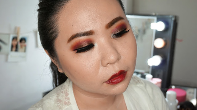 Fall Makeup Tutorial with warm red and brown eyes and dark red lipstick. using wet n wild lipstick in dark cherry and coastal scent 120 eyeshadow palette. Come and Join my Makeup and Hairdo Course to learn the technique with Theresia Feegy in Jakarta. Available for Personal Makeup Course, Advance Intense Pro Makeup Course, One Day Wedding Makeup Course and Basic Hairdo Course. For pricing and inquiries, kindly email to muses.wonderland@yahoo.com