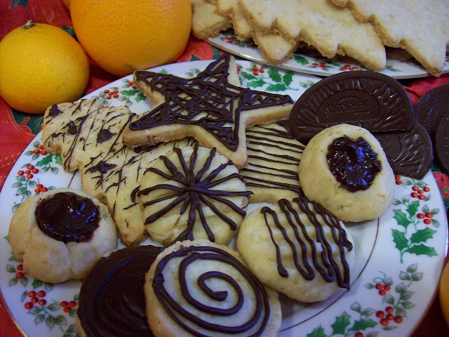 Orange Ambrosia Shortbread Cookies, plain and decorated with chocolate.