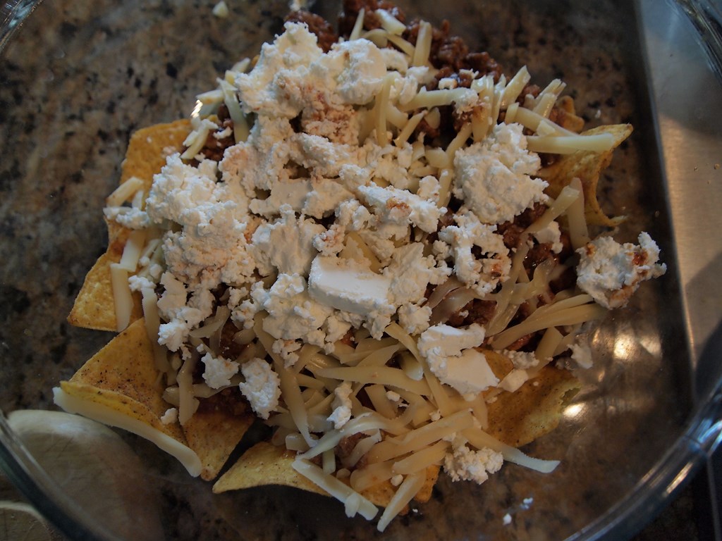 tortilla chips with meat and cheese