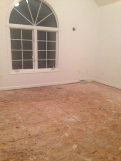 before pic of master bedroom after we removed carpet to prepare for hardwood flooring