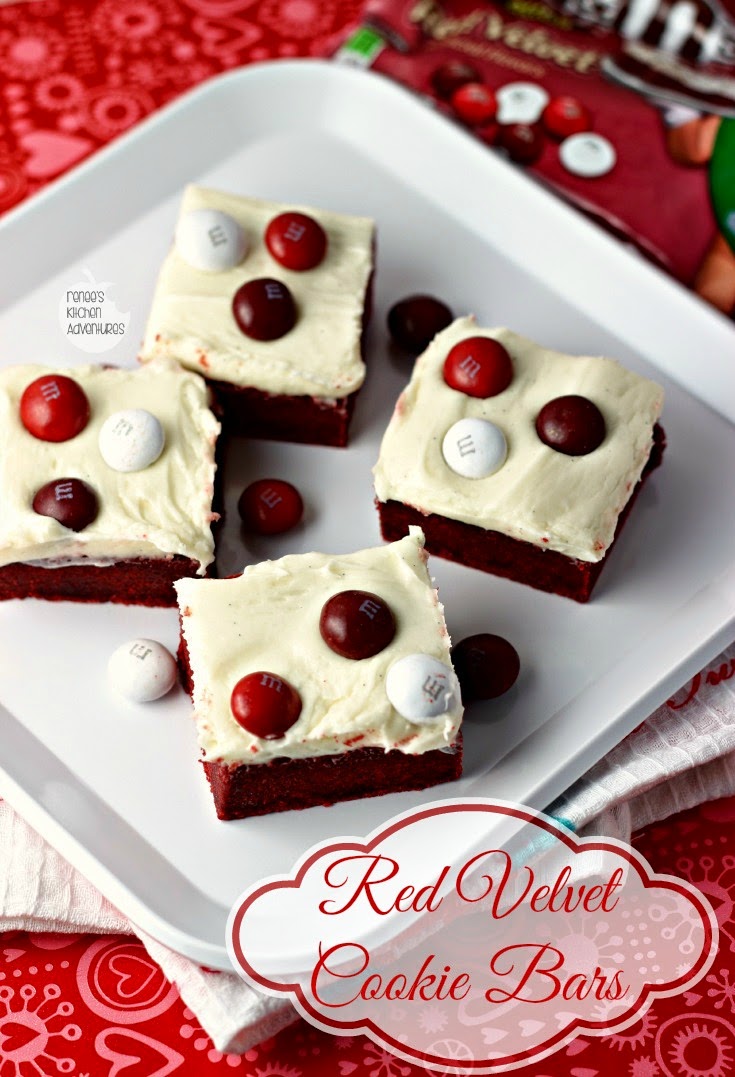 Red Velvet Cookie Bars | Renee's Kitchen Adventures: Brownie-like bars topped with cream cheese frosting and topped with M&M's® #RedVelvetLove #ad