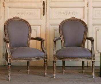 Vintage Armchairs Very cool Louis XVI worn gilt Armchairs, these have a great look, upholstered with dark grey cotton. 37H x 25W x 24D Seat Height: 17 Arm Height: 24 as seen on l&l