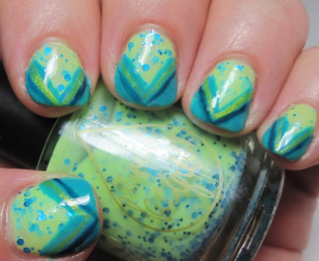 Blue Pistachio with a chevron tip and nail art
