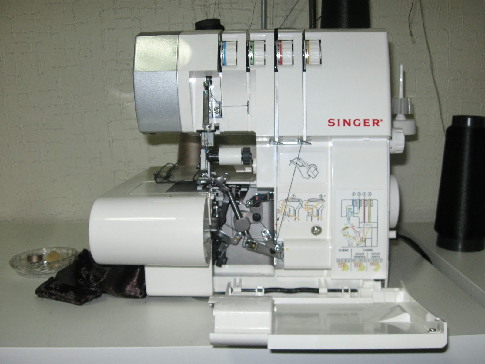 Luz er Comprei máquina Singer ultralock (overlock)