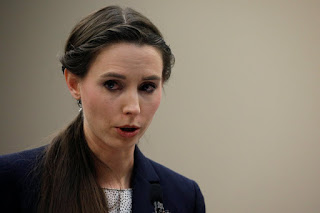 Survivor Rachael Denhollander speaks at the sentencing hearing on Jan. 24 for Larry Nassar, a former team USA Gymnastics doctor who pleaded guilty in November 2017 to sexual assault charges.