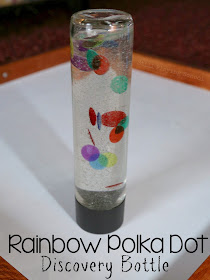 Create a rainbow dot discovery bottle for kids to observe color mixing in action! This is the perfect sensory calm down activity, too!