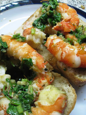 Shelled king prawns on ciabatta with garlic butter and herbs