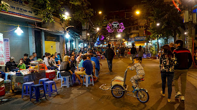 Evening at weekend nighttime marketplace inwards Old Quarter Bali Island place to visit: Hanoi, Sapa & Halong Bay, Vietnam Itinerary (9 days)