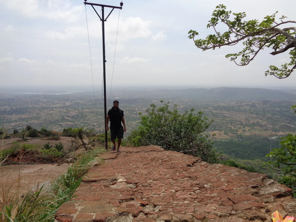 Savandurga Morning: A shot of the early morning light hitting the massive rock face of the hill.