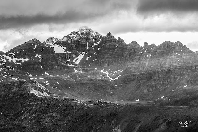 Black and white version of Castle peak with a fresh dusting of snow in the summer sunrise