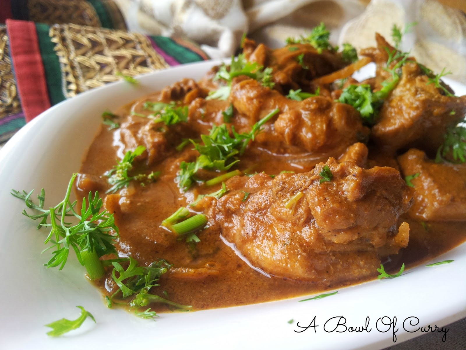 A Bowl Of Curry Chicken in Roasted Gravy