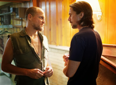 Christian Bale and Woody Harrelson in Out of the Furnace