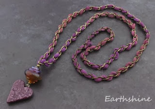 http://earthshine.indiemade.com/product/patterned-ceramic-heart-glass-bead-and-silk-ribbon-necklace?tid=1